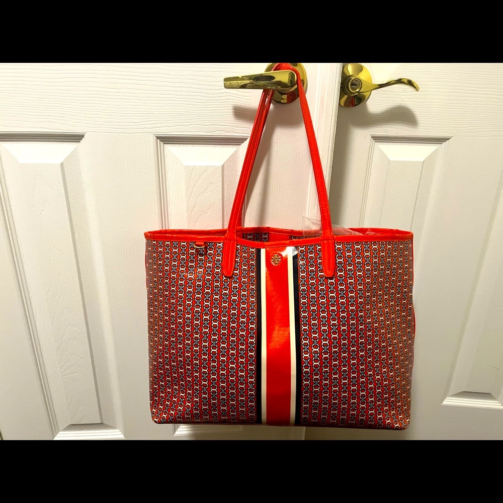 Tory Burch Orange & Multi color Gemini Tote in used condition!!
